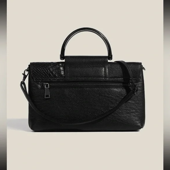 Black snakeskin print vegan leather clutchcrossbody bag